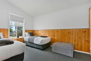 Кровать или кровати в номере Masons Cottages
