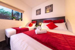 Postel nebo postele na pokoji v ubytování Ascot Budget Inn & Residences
