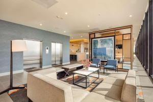 a living room with a couch and a table at Hyatt House Mexico City Santa Fe in Mexico City