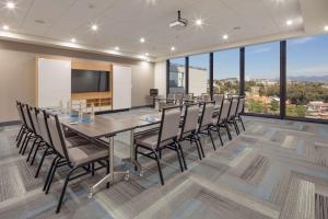a conference room with a long table and chairs at Hyatt House Mexico City Santa Fe in Mexico City +29 photos