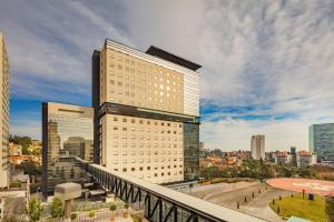 a view of a tall building in a city at Hyatt House Mexico City Santa Fe in Mexico City