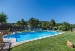 The swimming pool at or close to Casa Neus Barà