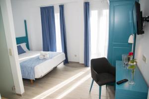 Posteľ alebo postele v izbe v ubytovaní Boutique Hotel Petit Sant Miquel