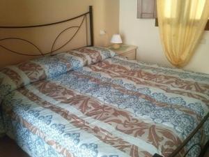 Postel nebo postele na pokoji v ubytování B&B Colti Di Rosa