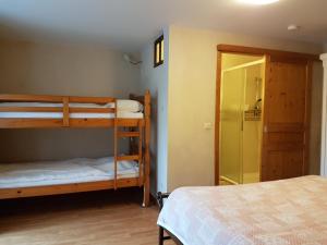 Postel nebo postele na pokoji v ubytování Gîtes Les Myosotis