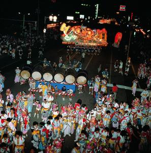 a group of people in a parade with a carnival at PittINN in Goshogawara +137 photos