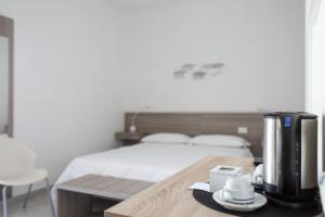 Postel nebo postele na pokoji v ubytování La Conchiglia sul Mare