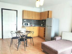 Kuchyň nebo kuchyňský kout v ubytování Lomsabai Apartments