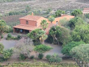 an aerial view of a house with palm trees at Haciendas del Valle - Casa San Miguel in Valle de Guerra