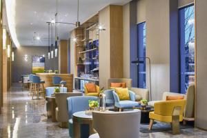 Uma área de estar em The Qube Hotel Shanghai Sanjiagang - Offer Pudong International Airport and Disney shuttle
