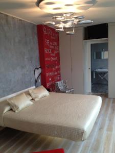 Кровать или кровати в номере Hotel Baia dei Pini