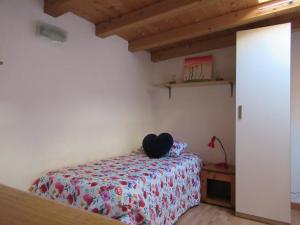 A bed or beds in a room at Cà Batuffolin