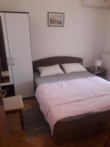 Ένα ή περισσότερα κρεβάτια σε δωμάτιο στο Apartments Residence Info Tourist