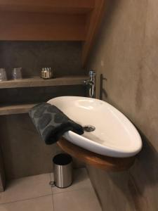 Ett badrum på Suites du Cabinet Vert