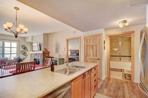 a kitchen with a sink and a counter top at PP301 Passage Point in Copper Mountain