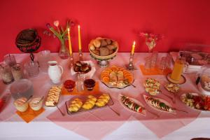 a table with many different types of food on it at Gutshaus Gottin in Warnkenhagen