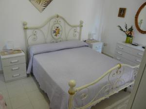 Cama ou camas em um quarto em Villa Yucca