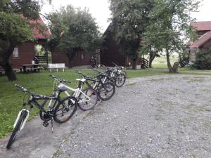 a group of bikes parked in front of a house at Casa Delureni in Delureni