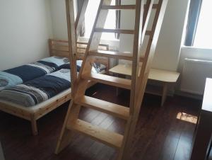 Postel nebo postele na pokoji v ubytování Horská chata Plzeňka Pernink