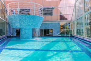 A piscina localizada em Golden Park Campos do Jordão ou nos arredores