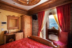 Postel nebo postele na pokoji v ubytování Hotel Le Ortensie