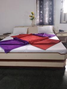 Postel nebo postele na pokoji v ubytování Hotel Mount Way