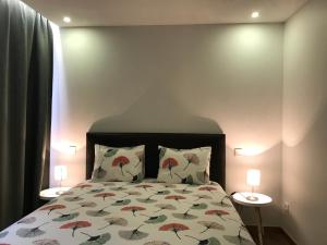 Postel nebo postele na pokoji v ubytování Povoa do Mar