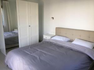 Postel nebo postele na pokoji v ubytování Moses Villa