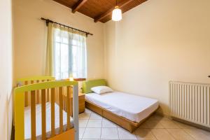 A bed or beds in a room at Femina