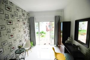 TV a/nebo společenská místnost v ubytování Zan HomeStay