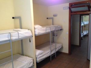 Postel nebo postele na pokoji v ubytování Albergue De Puntas De Calnegre