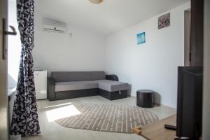 Postel nebo postele na pokoji v ubytování Andreea Residence Mamaia Nord