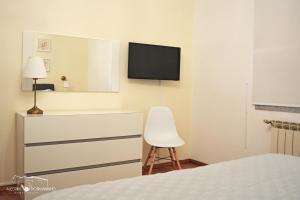 Uma cama ou camas num quarto em Alecrim Rosmaninho Guest House