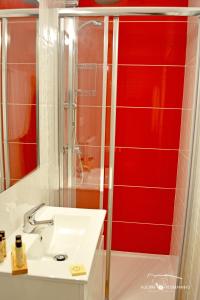 Uma casa de banho em Alecrim Rosmaninho Guest House
