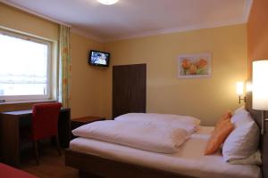 Voodi või voodid majutusasutuse Hotel Ricci toas