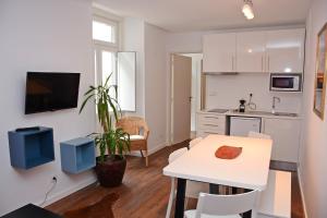A cozinha ou kitchenette de Fullest Apartments
