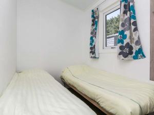 Cama o camas de una habitación en Holiday Home Hengelhoef-5 by Interhome