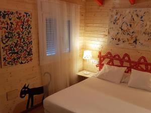 Łóżko lub łóżka w pokoju w obiekcie Las casas de Colinas
