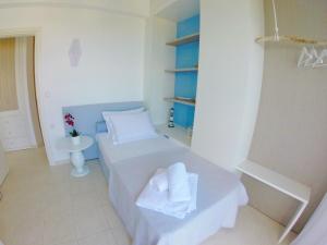 Letto o letti in una camera di Paliouri Sea Lounge by Luxlikehome
