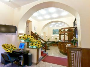 Lobbyn eller receptionsområdet på Hotel Pavone