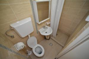 Ein Badezimmer in der Unterkunft Apartmani MV