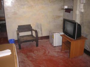 TV a/nebo společenská místnost v ubytování Tamarind Grand Resort Mae Sariang