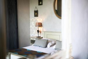 Posezení v ubytování Le Panoramic Boutique Hôtel