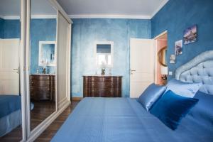 Ένα ή περισσότερα κρεβάτια σε δωμάτιο στο Stradivari Luxury Apartment