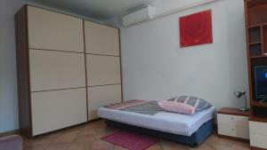 Postel nebo postele na pokoji v ubytování eco Apartment