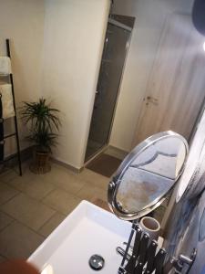 a bathroom with a sink and a shower with a mirror at B&b Villa Rosalia in Procida +51 photos