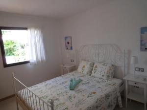 Postel nebo postele na pokoji v ubytování Bungalow Villa Sun + 37 fotografií