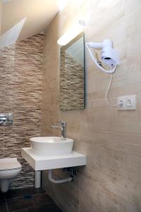 Vonios kambarys apgyvendinimo įstaigoje Gennadi Gardens exclusive apartments