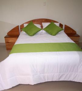 Postel nebo postele na pokoji v ubytování Alojamiento "Selva Del Sol"