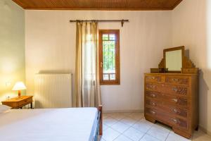A bed or beds in a room at Femina